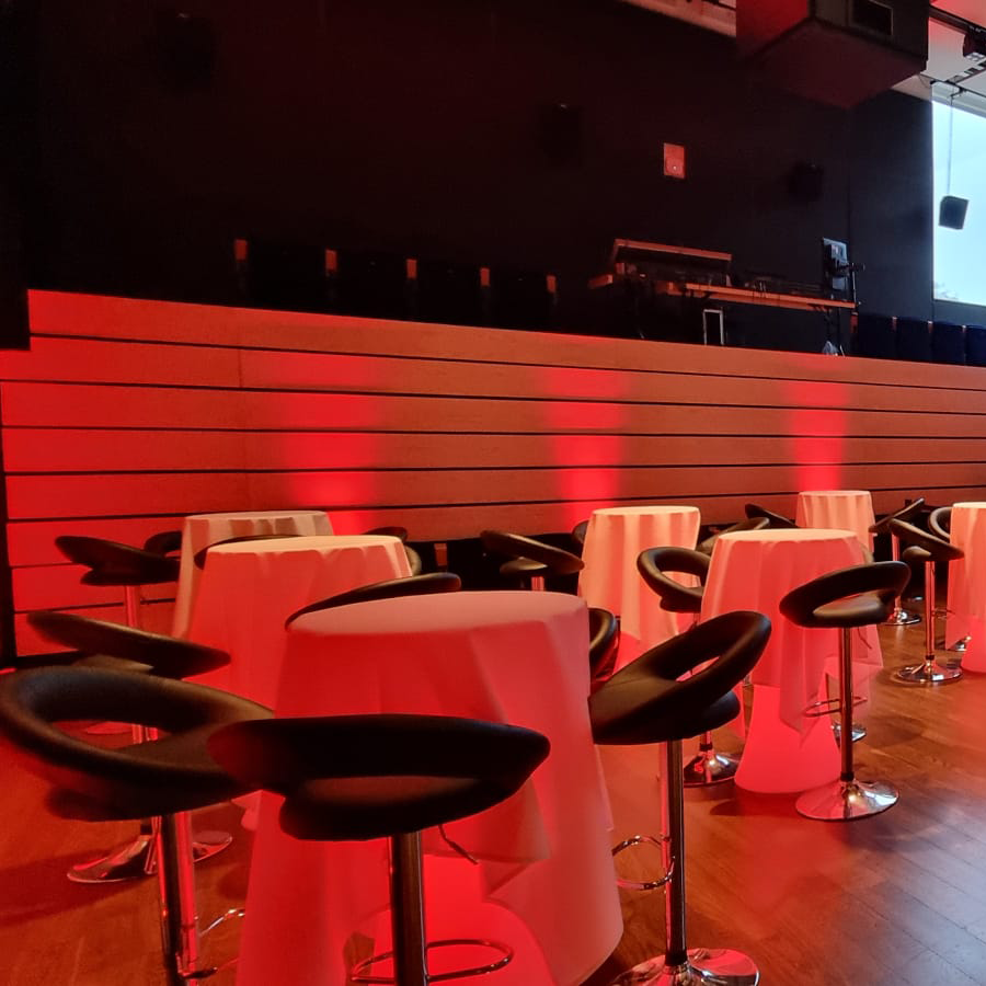 Interior of studio with tables and red light