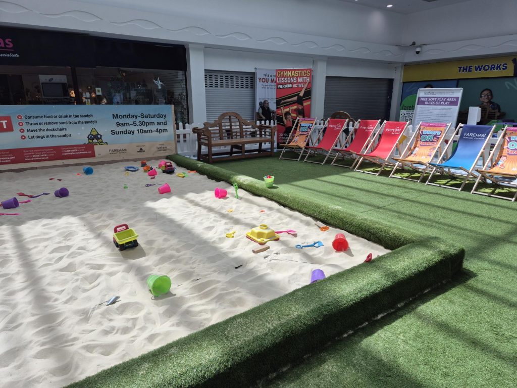 shared image (5) Sandpit with grassed area and deckchairs