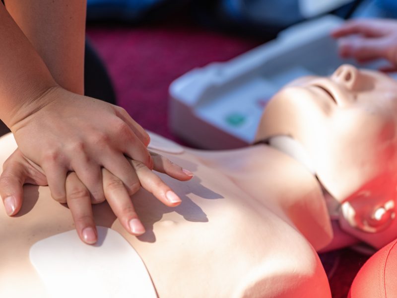 Cardiopulmonary Resuscitation, First Aid Training on a CPR Dummy.